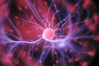 purple and pink plasma ball by Hal Gatewood courtesy of Unsplash.